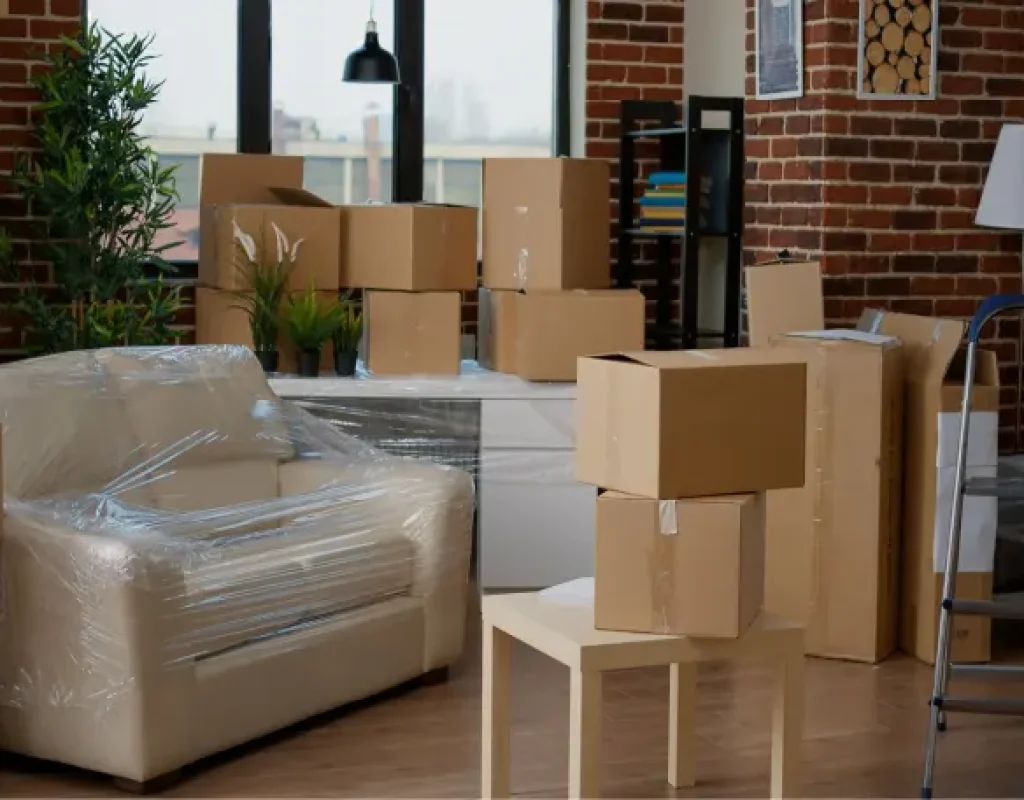 Packed and labeled boxes stacked neatly in a modern apartment