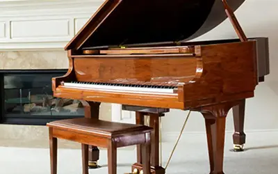 Safe piano relocation by experienced Packing Bees Movers
