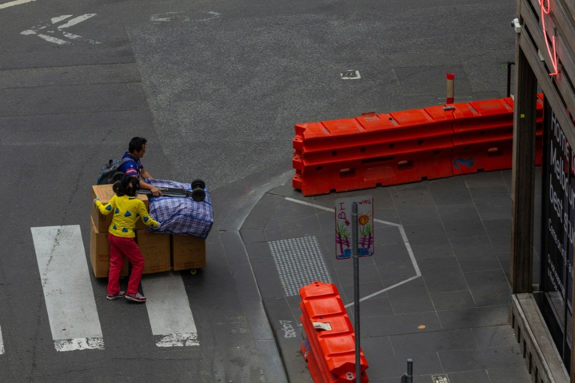 Movers transporting boxed furniture and household belongings for interstate moving services near me