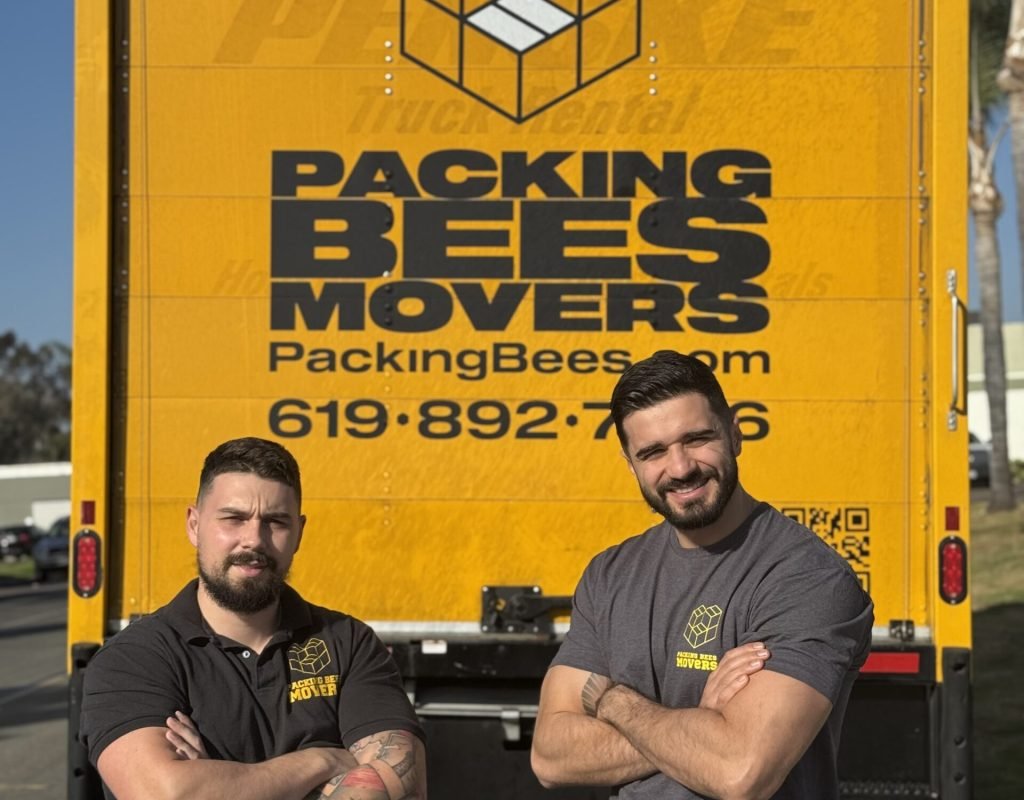 Professional mover wrapping and protecting furniture for a residential move