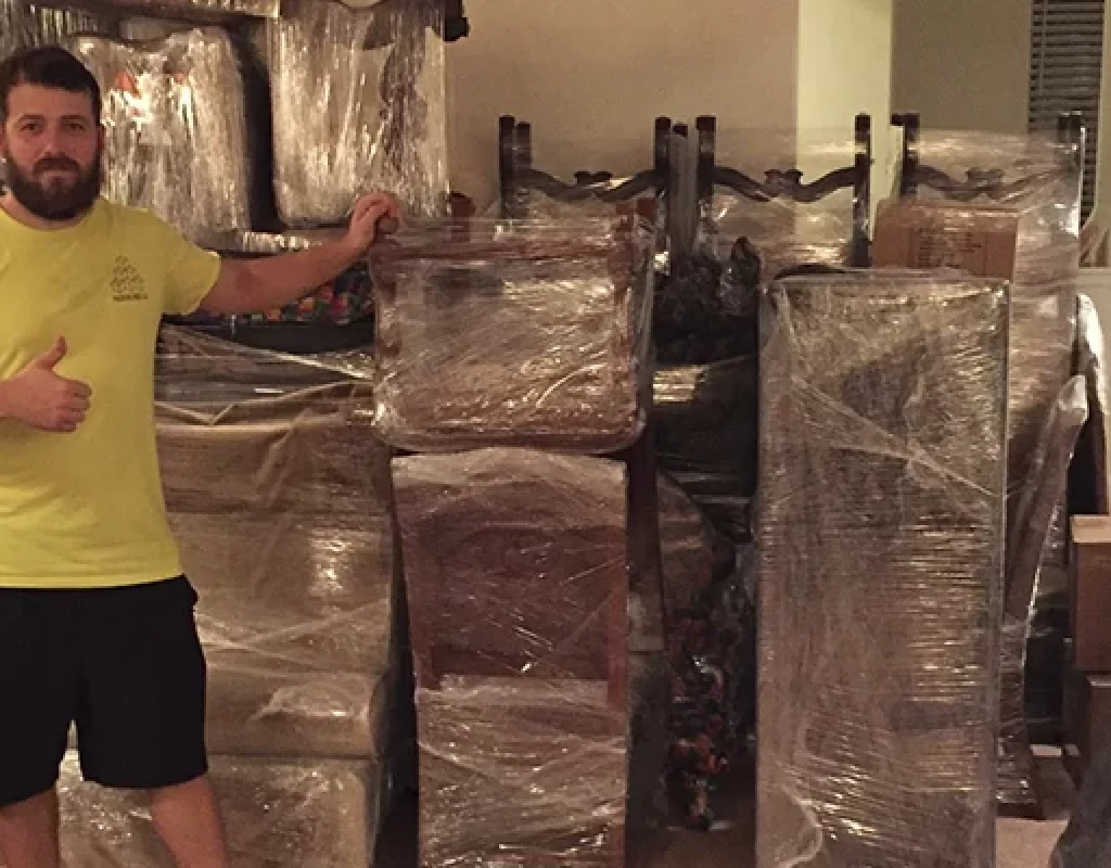 Packing Bees Movers staff wrapping furniture securely in La Jolla