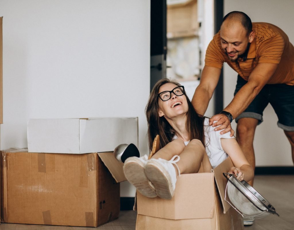 Packed and labeled boxes stacked neatly in a modern apartment